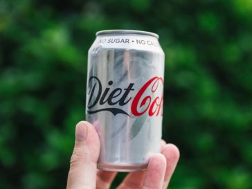 A sports nutritionist says drinking Diet Coke will help you lose weight, despite a new study that suggests the opposite